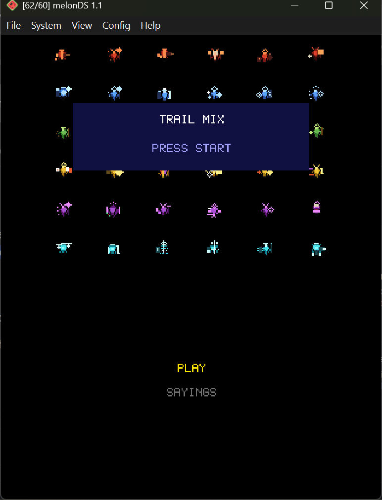 The Trail Mix title screen on a Nintendo DS: colorful pixel-art companions scattered around the logo.